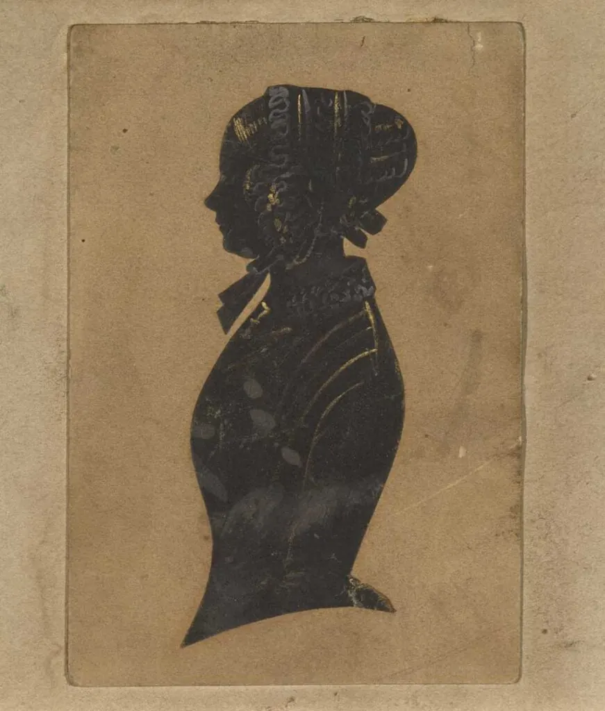 A painted and decorated silhouette portrait from the golden age of the art form
